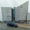 Luxury chauffeur van parked outside Titanic Belfast museum
